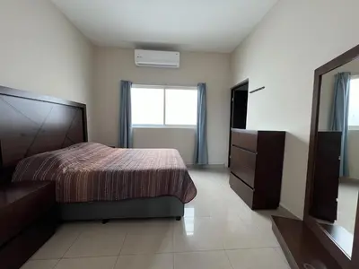 Cama o camas de una habitación en Casa Isla Marina Vista al Mar 20 Personas