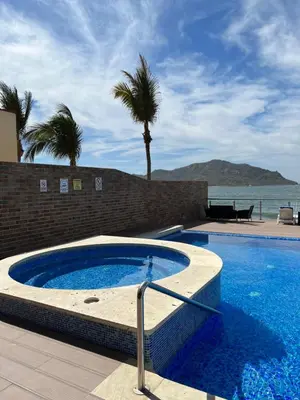 Piscina en o cerca de Departamento en Tramonto Resort con vista al mar