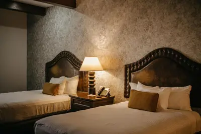 Cama o camas de una habitación en Hotel María Bonita Chihuahua