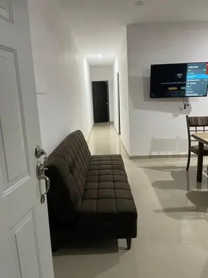 Una televisión o centro de entretenimiento en Departamento 103