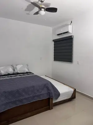 Cama o camas de una habitación en Departamento 102